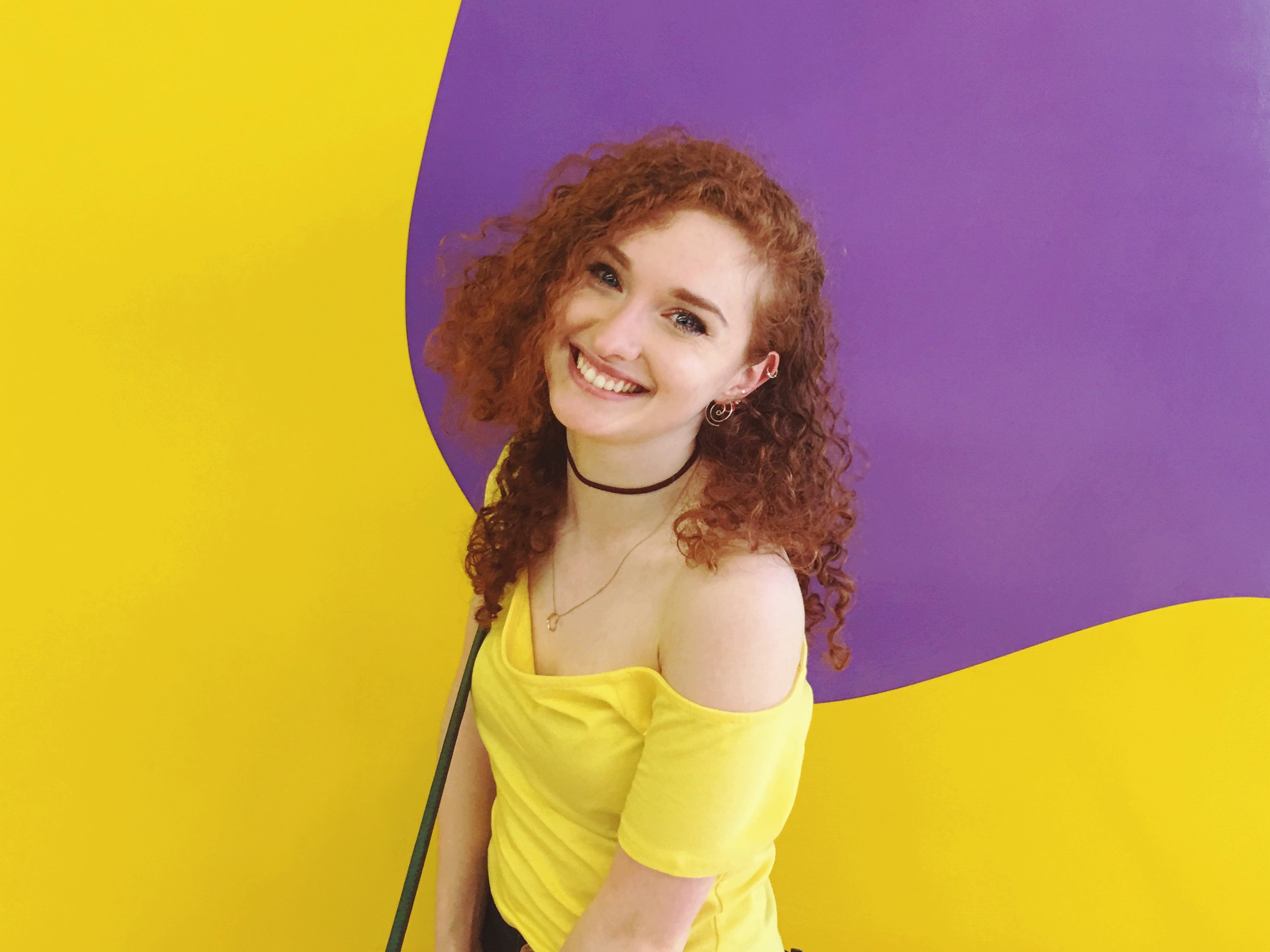 A Photo of Stefanie (in front of a Sol LeWitt painting 